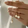Colar Colar com Pingente de Pérola Artificial Novo Cruzamento Europeu e Americano Design de Temperamento Conjunto de Brincos Colar de Pérola de Luxo Leve Atacado