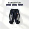 2026 Pantalones Nuevos para Niños Primavera y Otoño Nuevo Estilo Pantalones Deportivos para Niños Grandes Pantalones de Chándal Casuales para Niños Pequeños Pantalones Largos para Niños