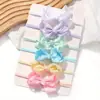 Set de lazos para niños de venta caliente transfronteriza, diadema elástica de color liso con diseño floral, accesorios para el cabello para niños al por mayor 351