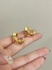 Pendientes de ondas geométricas doradas de verano europeos y americanos, diseño de personalidad de nicho, elegantes y ligeros, de lujo, para mujer.