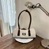 Bolso tipo baguette de alta gama y nicho para mujer, nuevo de verano 2026, versátil, exquisito bolso de hombro, bolso cruzado para el trabajo