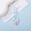 Chaveiro Pingente Urso de Resina Fofo com Laço de Bolinhas Coloridas Decoração de Sacola de Presente Cultural e Criativa DIY