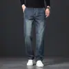 Jeans de outono e inverno para homens, cintura alta, perna reta, mistura de acrílico escovado, adequado para uso business casual, disponível em estoque do fabricante