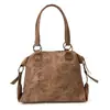 Nova bolsa de mão retrô com rebites 2026, grande capacidade, bolsa tote fashion para mulheres, bolsa de ombro, adequada para o trajeto diário, com design tridimensional