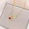 Collar Cruzado Europeo y Americano Pin de Amor Collar Cadena de Clavícula de Acero de Titanio Distintivo de Lujo Ligero para Mujer Estilo Ins Sentido Avanzado Nicho