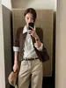 Suéter Tricô com Gola de Camisa Costurada Estilo Intelectual Old Money Han Xun para Mulheres Outono 2026 Top 27271