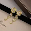 Pendientes retro de flores grandes transfronterizos Europa y Estados Unidos alta sensación moda flor perla pendientes largos estilo corte pendientes de temperamento