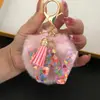 Fornecedor e Vendedor de Chaveiros Coloridos em Formato de Coração com as 26 Letras do Alfabeto, com Pompoms e Tassel, Pingentes para Chaves para Bolsas de Mulheres