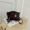 Bolso de mano de cuero suave de nicho transfronterizo 2026 nueva moda retro elegante bolso de hombro único bolso cruzado para ir al trabajo a la moda