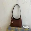 Bolsa de Ombro Grande Capacidade Estilo Retrô Feminina 2026 Outono/Inverno Nova Bolsa de Ombro de Pelúcia Camurça Simples Fashion
