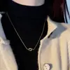 Colar com Pingente Nó do Coringa Amor Nicho Aço Titânio de Alta Qualidade Banhado a Ouro 18K Conjunto de Brincos
