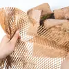 Papel colmeia papel quadriculado transfronteiriço em estoque fornecimento ecológico degradável papel colmeia amortecedor à prova de choque papel Kraft colmeia