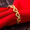Anillo de oro arena para mujer, anillo de oro simulado chapado en oro con abertura, flor de cuatro hojas por todo el cielo estrellado, anillo de oro al por mayor