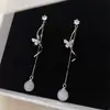 Pendientes Largos de Estilo Ins de Lujo Ligero con Borlas de Mariposa y Piedra Ojo de Gato, con una Vibra Suave, Pendientes Simples y de Nicho de Alta Gama