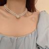 Collar de perlas de doble capa, collar de nicho de alta gama para mujer, diseño de lujo ligero, cadena de clavícula, nuevas explosiones 2024