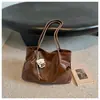 Bolso tote de estilo coreano de nicho minimalista transfronterizo para mujer, nuevo bolso tipo cubo de gran capacidad, bolso de hombro casual para el día a día