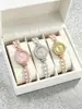 Reloj brazalete de perlas de lujo ligero estilo ins con esfera incrustada de diamantes para mujer opción de regalo reloj Xilu
