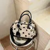 Bolso de hombro de gran capacidad con lunares para mujer, nuevo modelo 2026, bolso versátil para el día a día, bolso cruzado de diseño exclusivo con un toque de alta gama