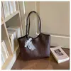 Bolso tote tejido transfronterizo para mujer 2026 súper ventas, bolso de hombro para axila, bolso de mano versátil de alta capacidad, moda de lujo ligero