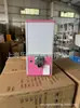 Adereços promocionais na cor rosa: Máquina de chicletes quadrada comercial, máquina de loteria de mesa, máquina de cápsulas de café, máquina de doces de bolinha pula-pula