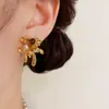 Otoño e Invierno Nuevo Estilo Pendientes Metálicos de Fuegos Artificiales con Piedra Ojo de Tigre Personalizados Lujo Ligero Estilo Fresco Pendientes Versátiles Venta al por Mayor