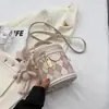 Bolso Cilindro Estampado Rombo para Mujer 2026 Nuevo Estilo Bolso de Mano Versátil para Viajes Cotidianos Bolso Cubo Bolso de Hombro Único Bolso Cruzado