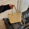 Bolso cubo bordado de moda transfronterizo, bolso de hombro con elegante patrón tejido vintage, bolso cruzado de cadena versátil y moderno para comercio exterior