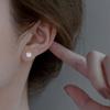 Aretes de plata esterlina S999 de diente de león para mujer, diseño de nicho, lujo ligero, viento frío, agujero para la oreja, joyería de plata para la oreja al por mayor