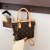 Bolso Cubo Estampado Retro de Comercio Exterior para Mujer 2026 Nuevo Elegante Diseño de Nicho Versátil Bolso de Mano Cruzado de un Solo Hombro