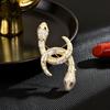 Atmósfera europea y americana moda broche serpiente sinuosa en forma de serpiente de lujo de alto nivel circón serpiente espiritual animal zodiaco corsage