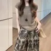 Procesamiento Personalización Verano Nueva Moda Casual Holgado Sentido del Diseño Nicho Suéter Tejer Hueco Pantalones de Pierna Ancha Dos