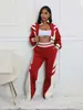 Td2789 Ropa Femenina Transfronteriza Europea y Americana Otoño e Invierno Nuevo Conjunto de Dos Piezas con Top de Cuello Alto con Cremallera y Pantalones Largos de Bloques de Color para Mujer