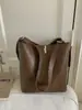 Bolso de Hombro Retro Transfronterizo de Gran Capacidad para Mujer Nuevo Estilo 2026 Bolso Cubo Simple para Hombro Bolso Cruzado Versátil