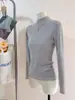 Camiseta Base de Punto con Cuello Alto y Hilo de Mecha para Mujer Otoño e Invierno 2026 Suéter con Cuello Alto y Hombro Normal