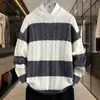Nuevo tejido de punto para suéter de otoño e invierno, prenda exterior unisex, suéteres a rayas de corte holgado para adolescentes, suéteres de bloques de color de moda para parejas