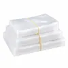 Sacos a vácuo texturizados novos para alimentos, apresentando um design de malha pontilhada, são fáceis de rasgar, possuem selagem em três lados e são ecologicamente corretos para contato com alimentos