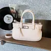Diseño de Nicho Transfronterizo Primavera 2026 Nuevo Estilo Simple Alta Gama Textura Bolso de Mujer Hombro Único Axila Cruzado Bolso Cubo