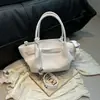 Bolso de mano único y elegante para mujer 2026 nueva moda patrón de lichi bolsa tipo cesta versátil para hombro y cruzado
