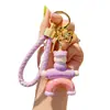 Popular llavero de oso de arcilla de colores electrochapado colgante para pareja femenina llavero colgante de bolsa adornos lindos de dibujos animados exquisitos