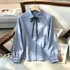 E-commerce transfronteiriço, AliExpress: Camisa de outono/primavera com laço, design bordado e detalhe de amarrar, manga longa para mulheres
