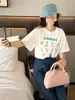 Camiseta de Hombro de Algodón Puro con Estampado de Dibujos Animados Estilo Japonés para Mujer Verano Diseño Nicho Holgada Chic Estilo de Hong Kong Top