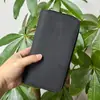 Explosões do TikTok Atualização e Aumento de Capacidade Bolsa de Mão Masculina em Couro Genuíno Couro Crazy Horse Porta-Cigarros Celular Carteira Clutch Peça Única