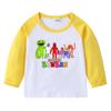Camiseta infantil de primavera y otoño 2023, nueva camiseta de manga larga con cuello redondo y dibujos animados, camiseta de algodón para bebés y niños.