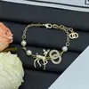 Pulsera Doble C de Perlas y Diamantes Estilo Chanel 2025 para Mujer, Nueva Pulsera de Ciervo Estilo Palacio, Versión de Alta Gama al por Mayor