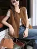 Chaleco chaqueta blazer cardigan de corte holgado, adelgazante y que favorece la figura para mujer, adecuado para principios de primavera y otoño, en un look de capas estilo francés