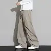 Calça masculina com barra curva estilo americano, novo modelo outono 2026, caimento solto, fluido, calça casual de perna reta, calça versátil de trabalho de perna larga