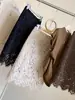 Falda midi de terciopelo hueca de encaje vintage estilo francés para mujer, nueva de principios de otoño, de cintura alta, adelgazante, elegante, ajustada al cuerpo