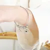 Nueva variedad de colgante de forma estrellas de bebé circón inglés digital pulsera de acero de titanio amor joyería de nicho