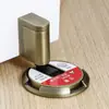 Sin perforaciones a prueba de viento no magnético succión puerta de baño trasera anti-colisión mecánica succión de puerta ajustable fuerte puerta toque largo