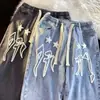 Venta al por mayor transfronteriza estilo Hong Kong marca de moda jeans con estampado de estrellas, primavera/verano finos versátiles holgados rectos casuales pantalones de algodón